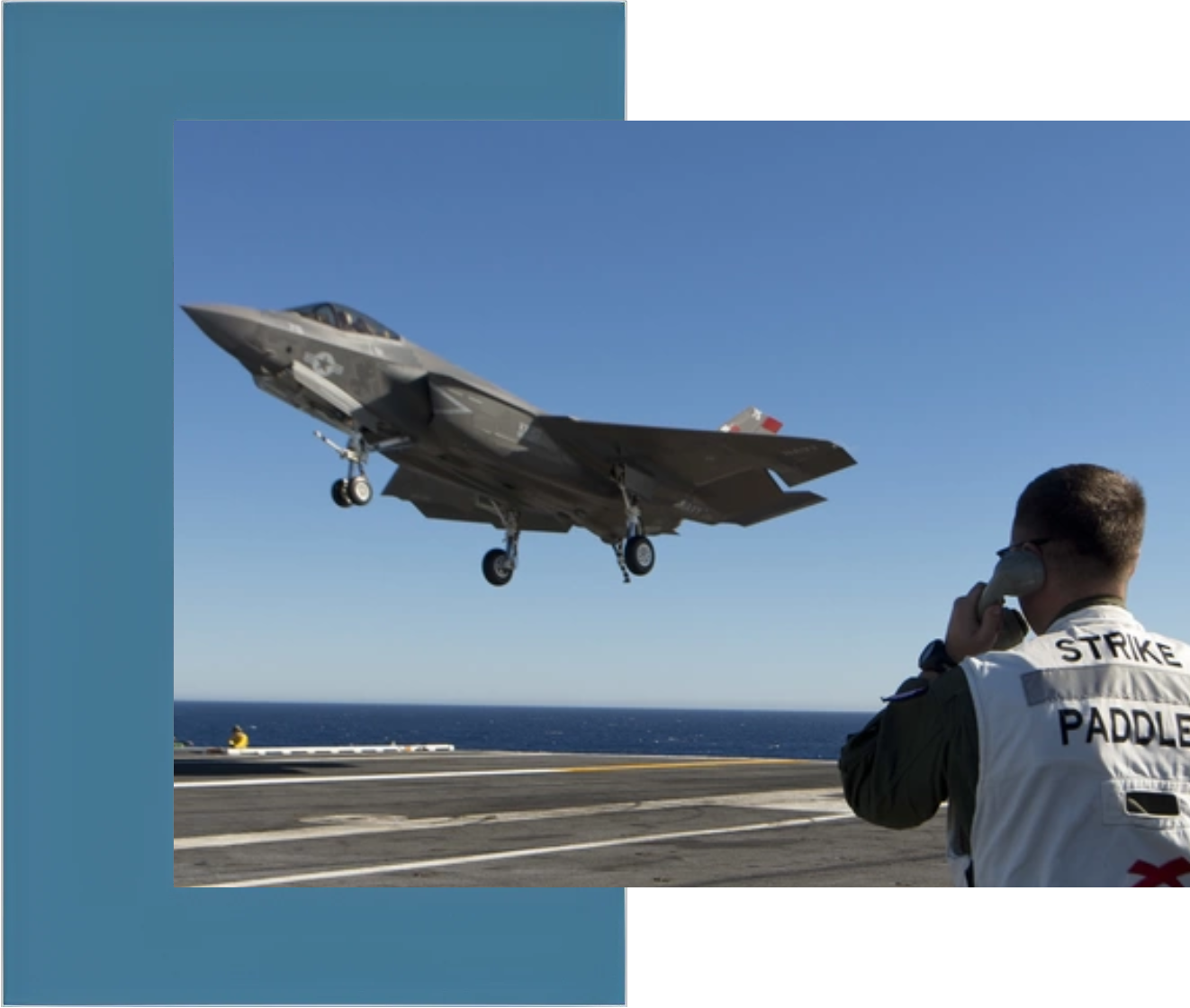 A fighter jet taking off from an aircraft carrier.