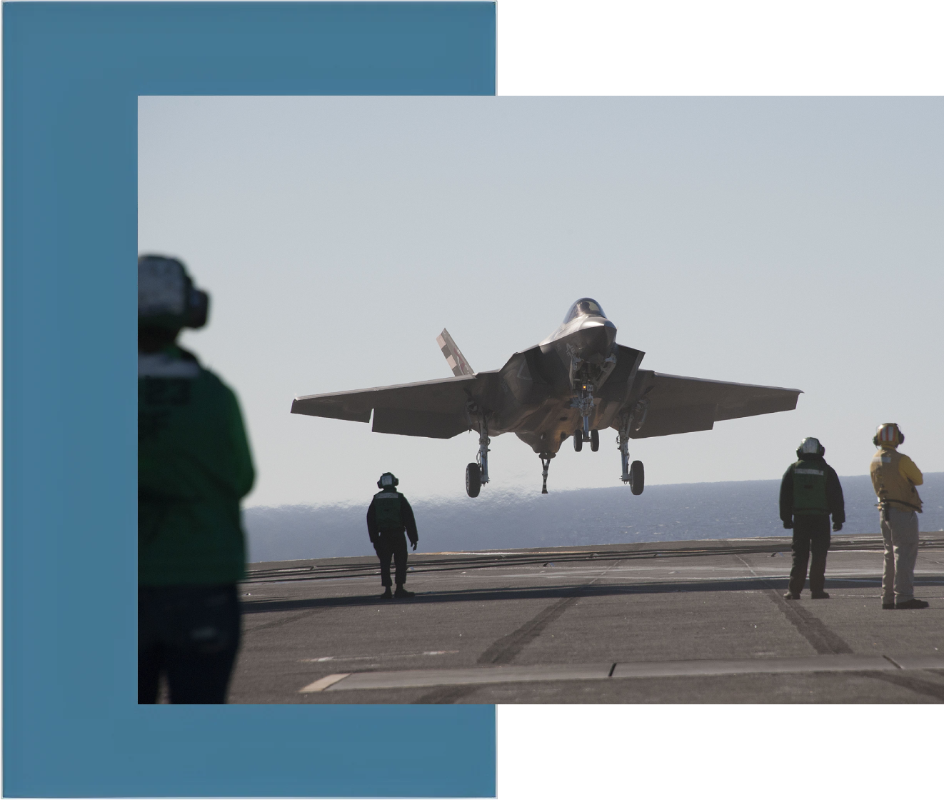 A fighter jet taking off from an aircraft carrier.