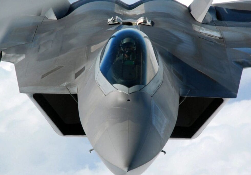 A fighter jet flying through the sky.